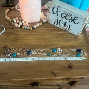 Necklace. Turquoise colored variety of beads. 13 inches long.